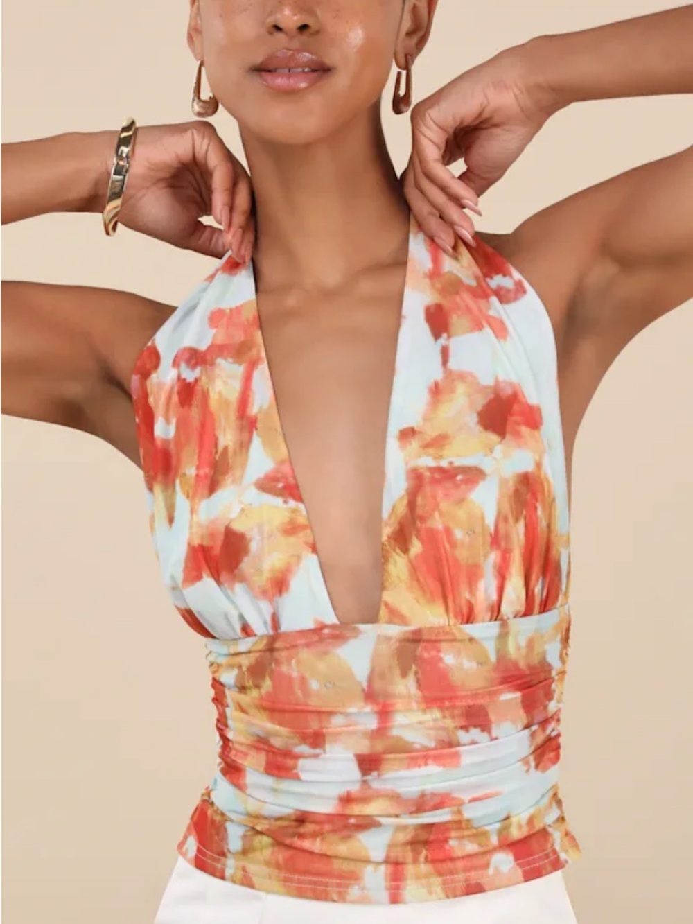 Ayaka Light Blue and Orange Abstract Mesh
Halter Top